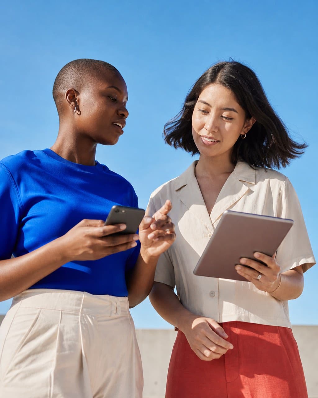 Two business owners reviewing performance together